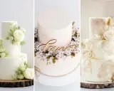 Trzy torty weselne w stylu boho: jeden z białymi różami i złotymi płatkami, drugi z napisem "love" i kwitnącą wiśnią, trzeci z koronkowym wzorem i suszonymi trawami.
