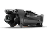 Szary dron DJI Mini 5 Pro Fly More Combo z kamerą 1-calową, gotowy do lotu i uchwycenia niesamowitych ujęć.