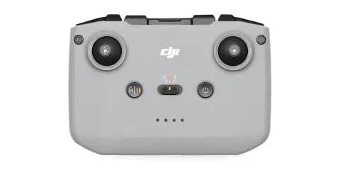 Szary kontroler DJI RC-N3 z dwoma joystickami, przyciskami i logo DJI. Idealny do sterowania dronem.
