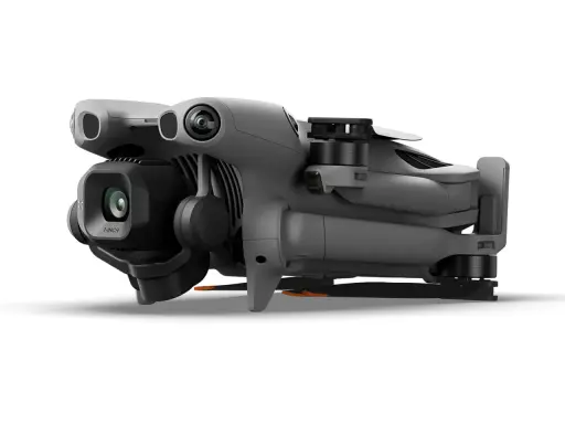 Szary dron DJI Mini 5 Pro Fly More Combo z kamerą 1-calową, gotowy do lotu i uchwycenia niesamowitych ujęć.