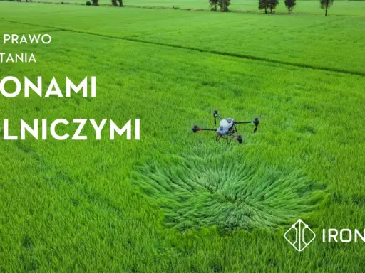 Nowe prawo do latania dronami rolniczymi. Dron DJI w locie nad zielonym polem. Fly safe!