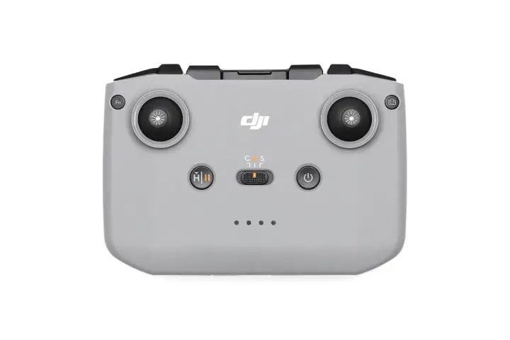 Szary kontroler DJI RC-N3 z dwoma joystickami, przyciskami i logo DJI. Idealny do sterowania dronem.